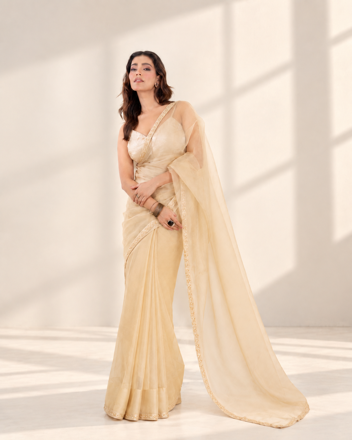 Champagne Organza Saree with Pearl & Cutdana Embroidered Lace Border and Matching Organza Blouse Piece | Fall & Pico Ready