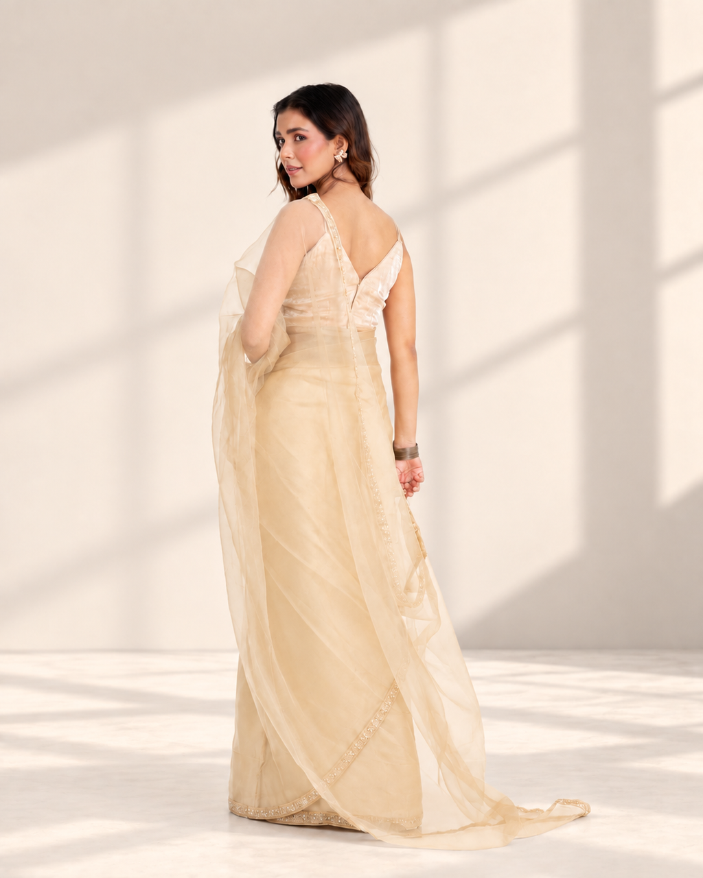 Champagne Organza Saree with Pearl & Cutdana Embroidered Lace Border and Matching Organza Blouse Piece | Fall & Pico Ready