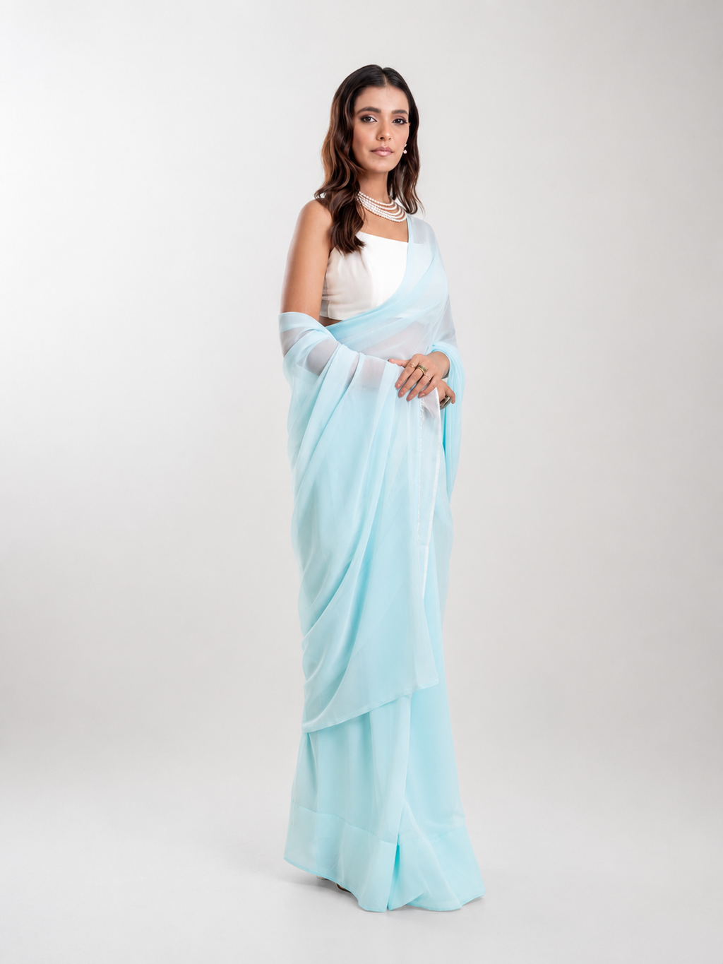 Powder Blue Georgette Saree with White Panel & Drop Lace Border with Self Blouse Piece