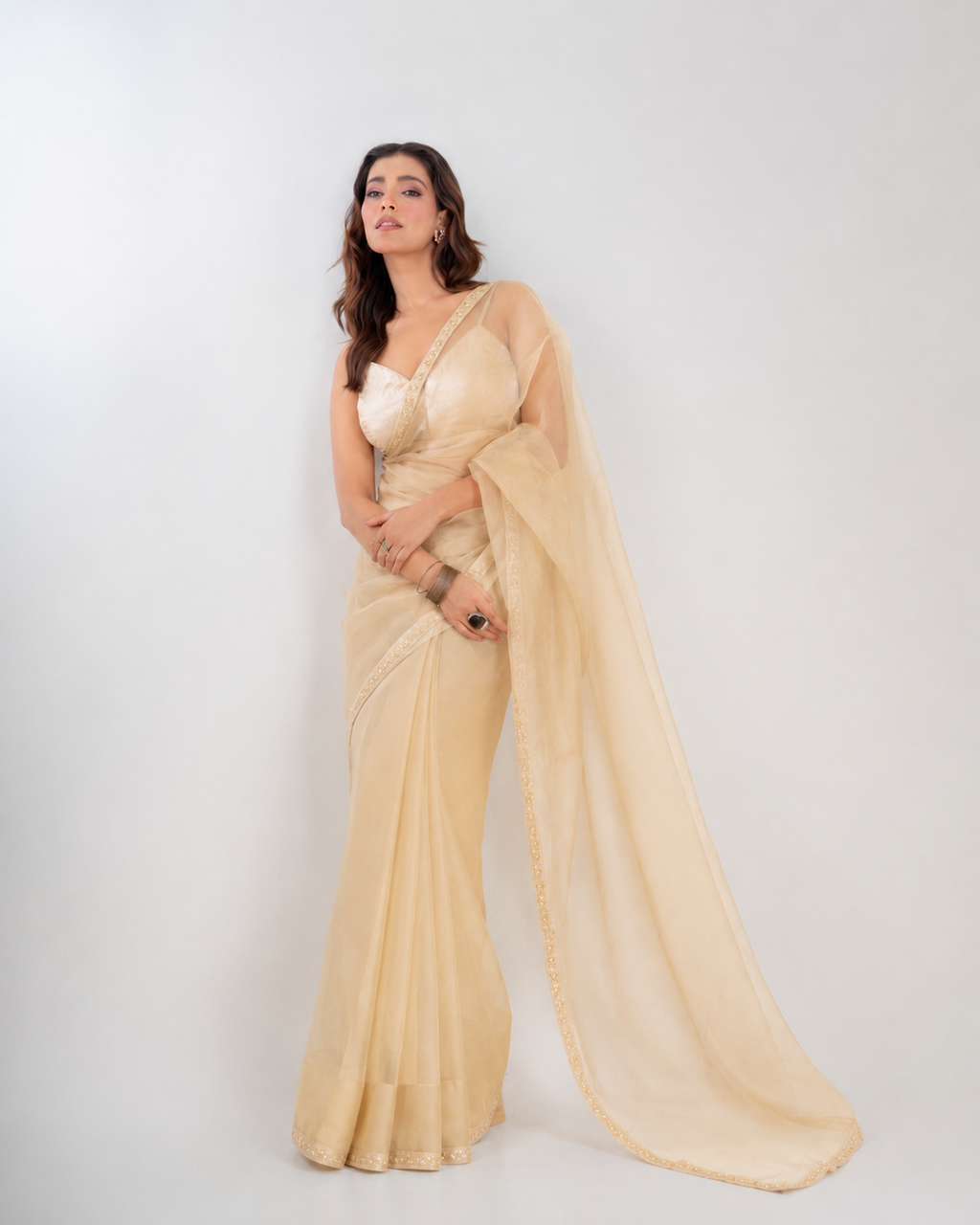 Champagne Organza Saree with Pearl & Cutdana Embroidered Lace Border and Matching Organza Blouse Piece