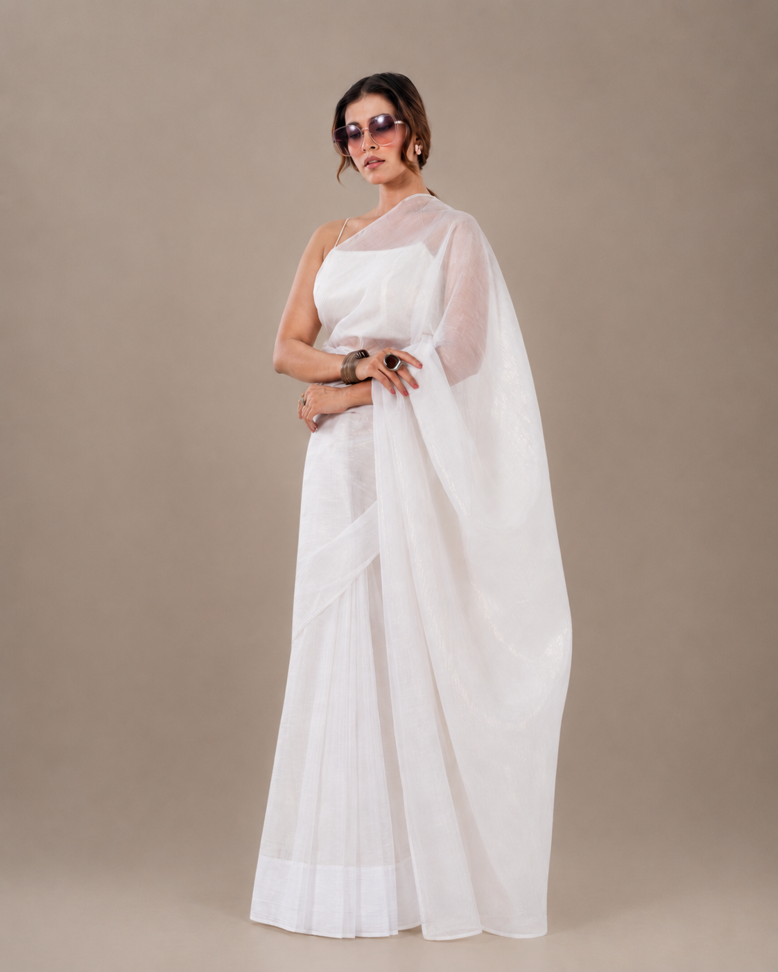 Ivory Crushed Chiffon Saree with Gold Coating, Handcrafted Tassels and Matching Blouse Piece