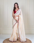 Ivory Silk Blend Saree with Maroon Embellished Border & Matching Blouse Piece