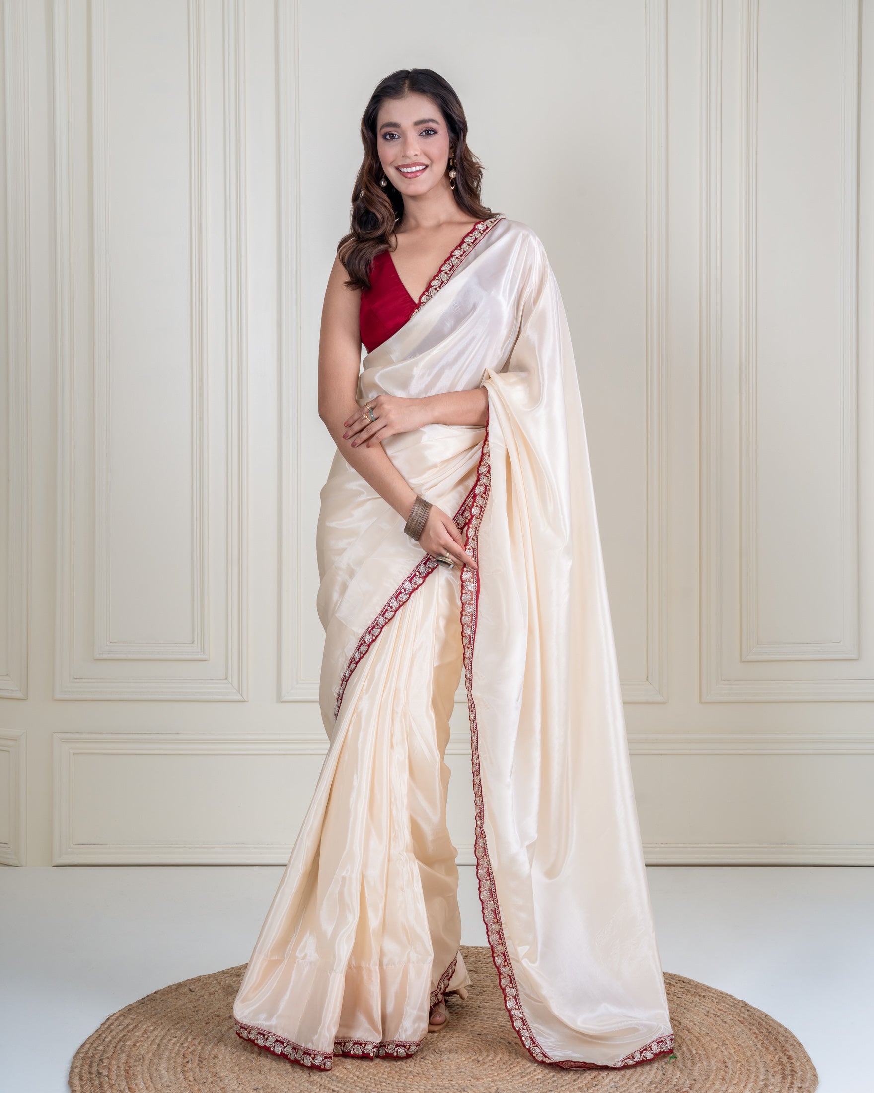 Ivory Silk Blend Saree with Maroon Embellished Border & Matching Blouse Piece