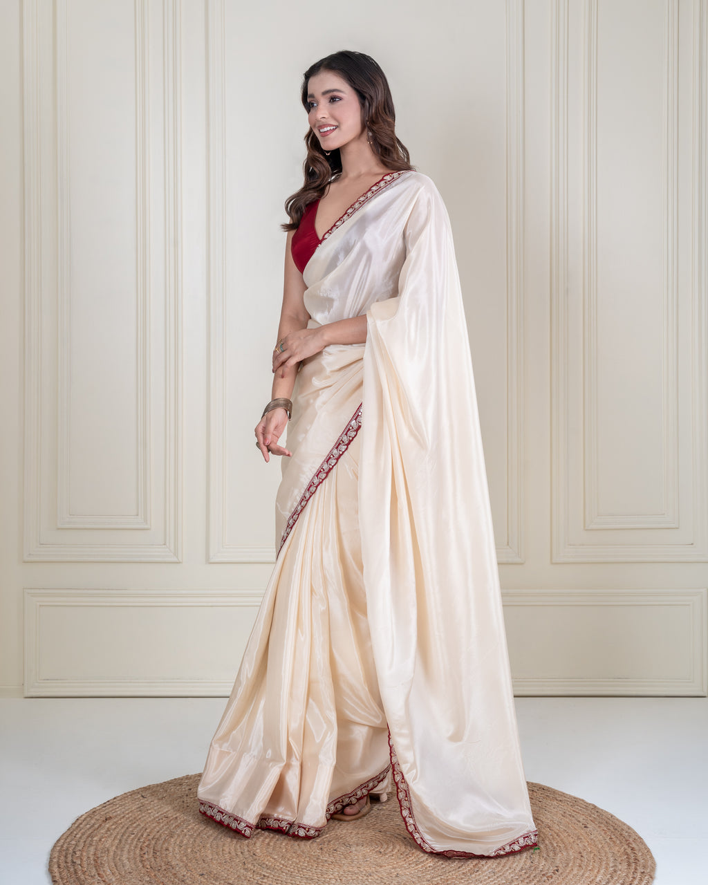 Ivory Silk Blend Saree with Maroon Embellished Border & Matching Blouse Piece