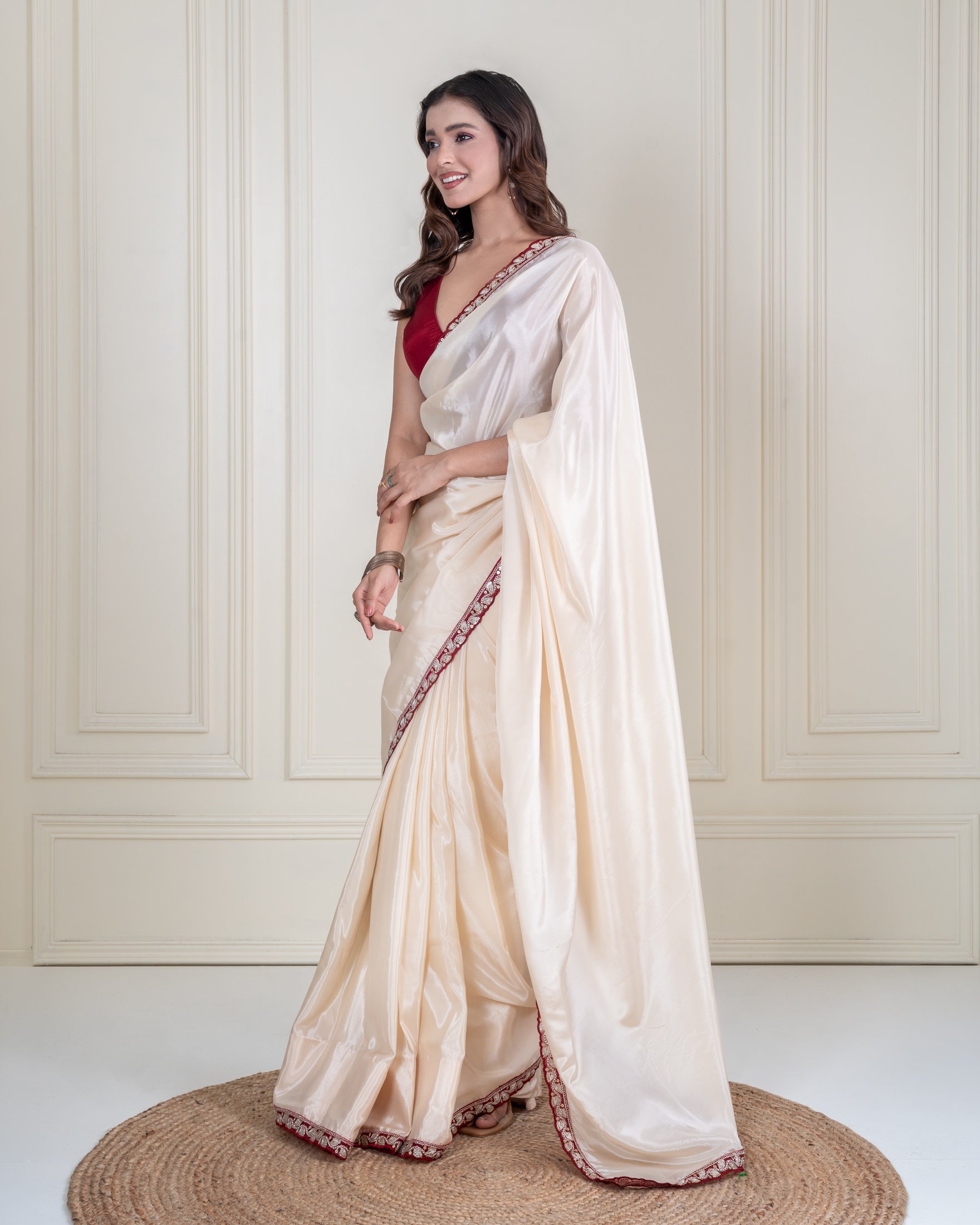 Ivory Silk Blend Saree with Maroon Embellished Border & Matching Blouse Piece