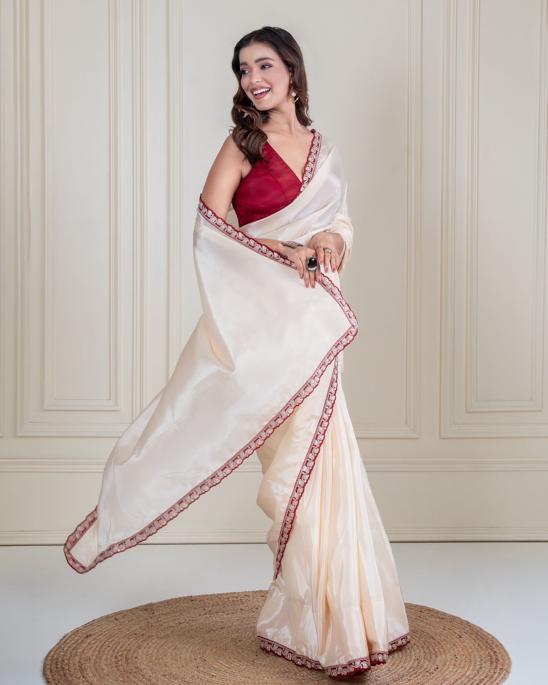 Ivory Silk Blend Saree with Maroon Embellished Border & Matching Blouse Piece