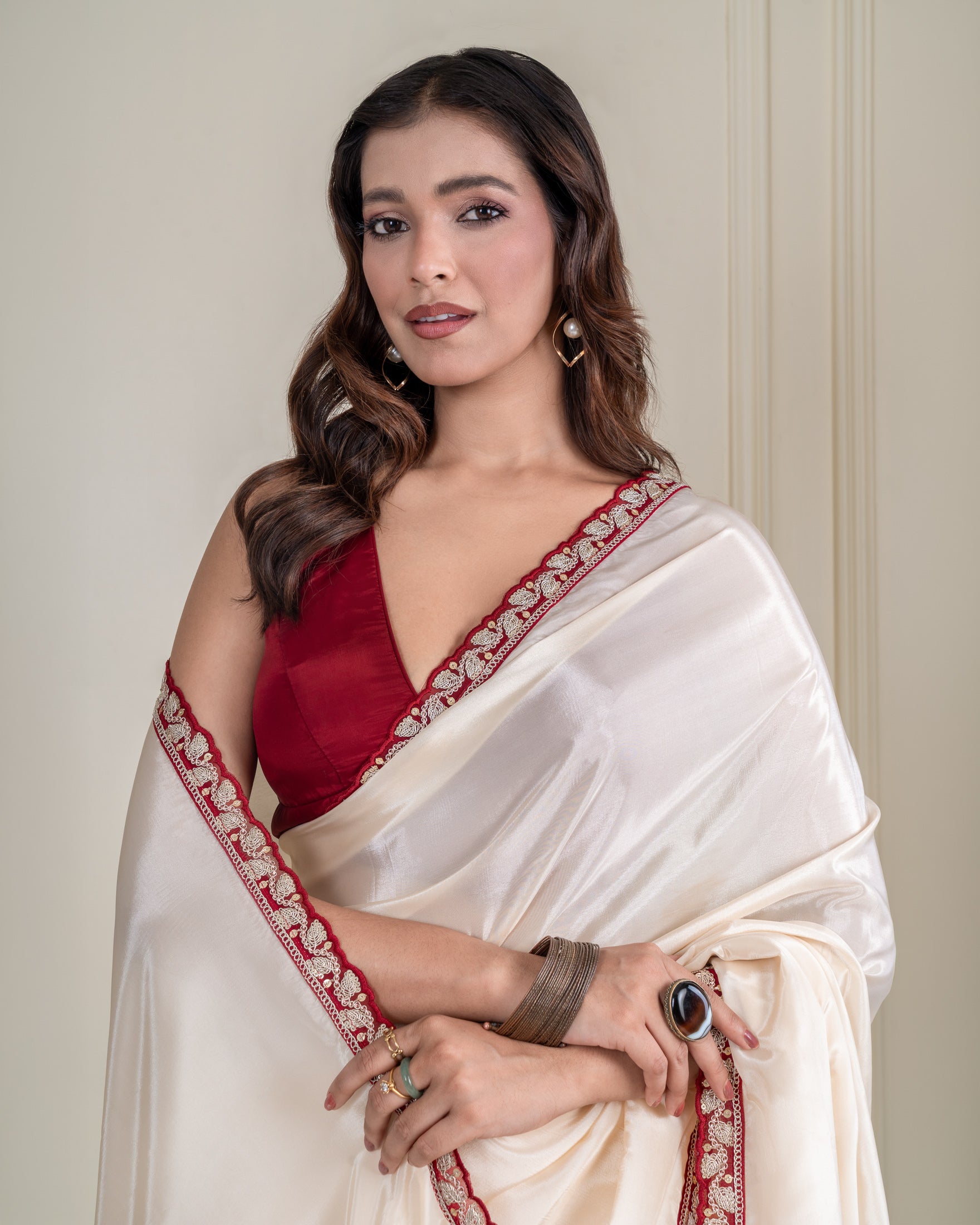 Ivory Silk Blend Saree with Maroon Embellished Border & Matching Blouse Piece