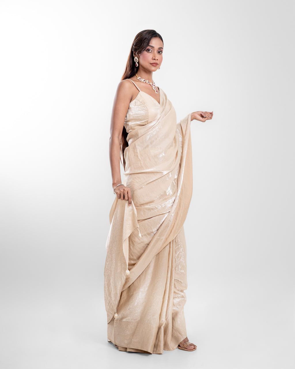 Champagne Cashino Saree with Handcrafted Tassels and Matching Blouse Piece