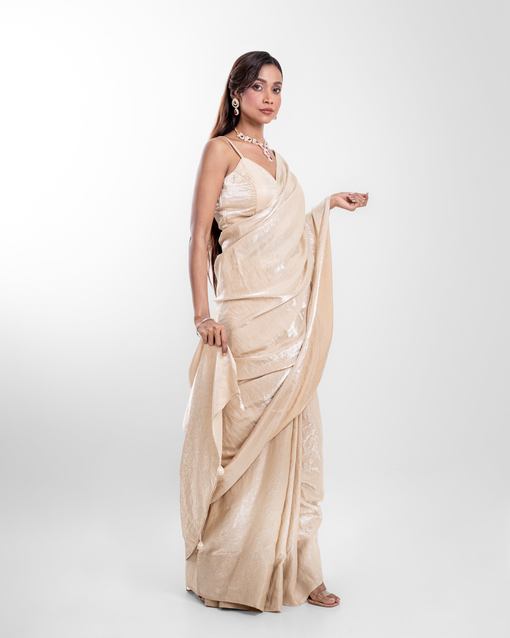 Champagne Cashino Saree with Handcrafted Tassels and Matching Blouse Piece