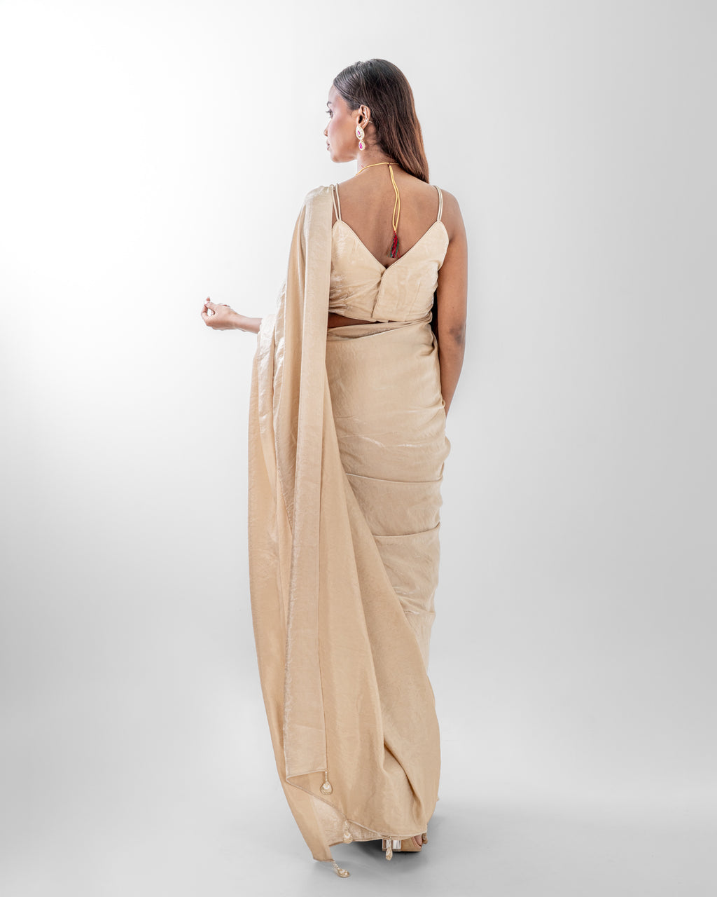 Champagne Cashino Saree with Handcrafted Tassels and Matching Blouse Piece
