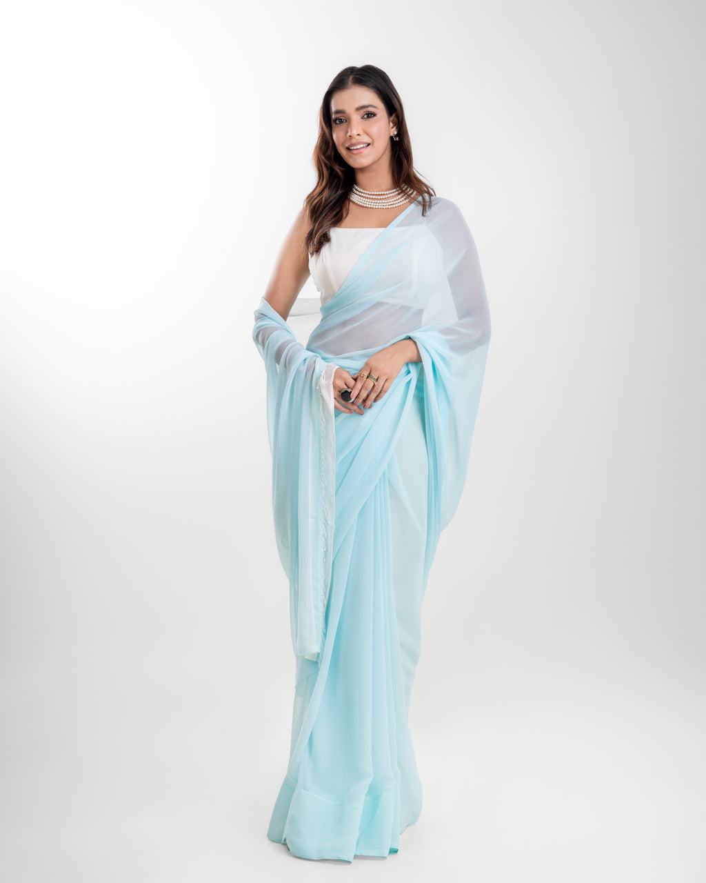 Powder Blue Georgette Saree with White Panel & Drop Lace Border with Self Blouse Piece