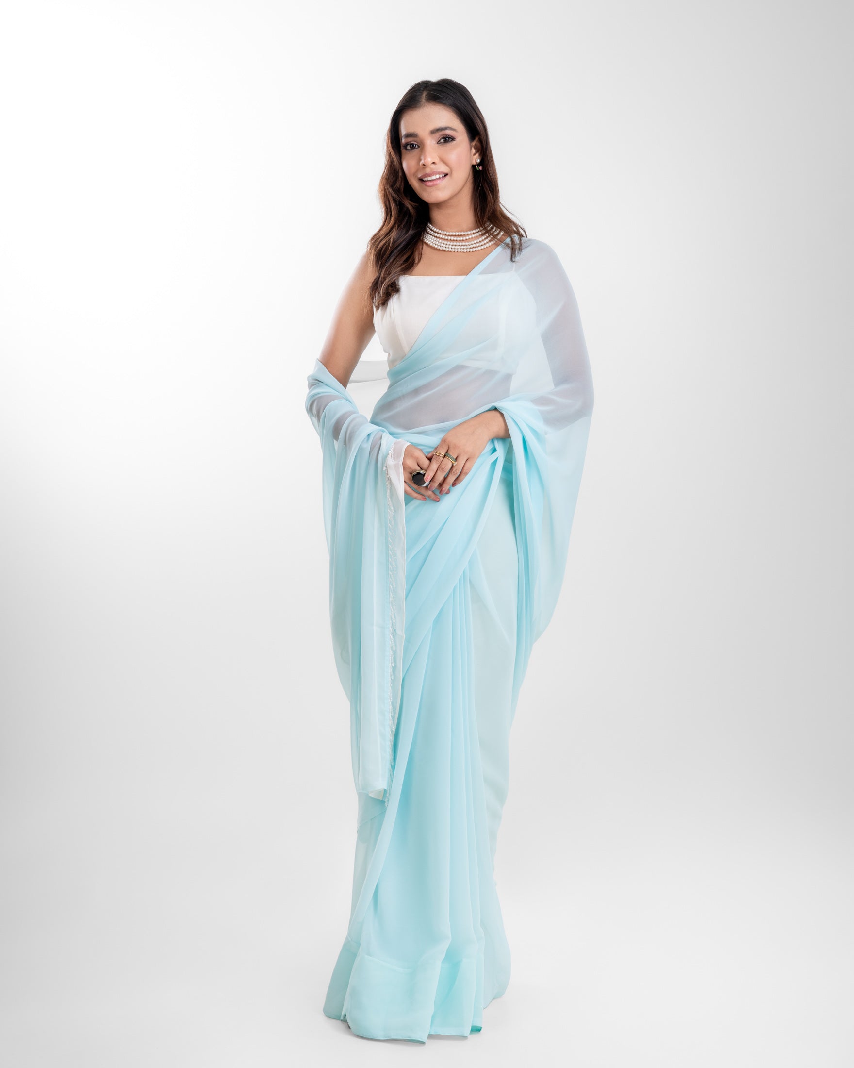 Powder Blue Georgette Saree with White Panel & Drop Lace Border with Self Blouse Piece