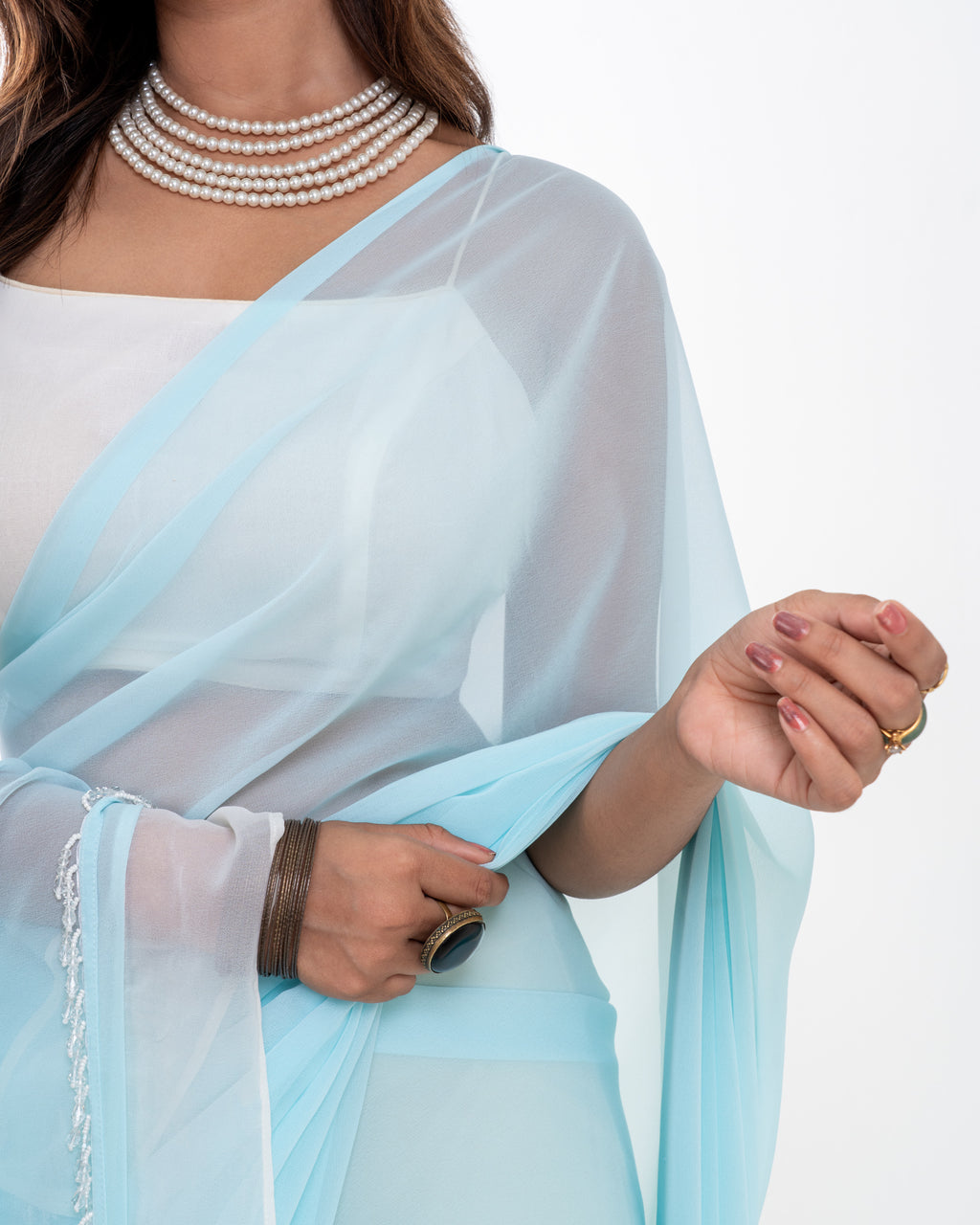 Powder Blue Georgette Saree with White Panel & Drop Lace Border with Self Blouse Piece