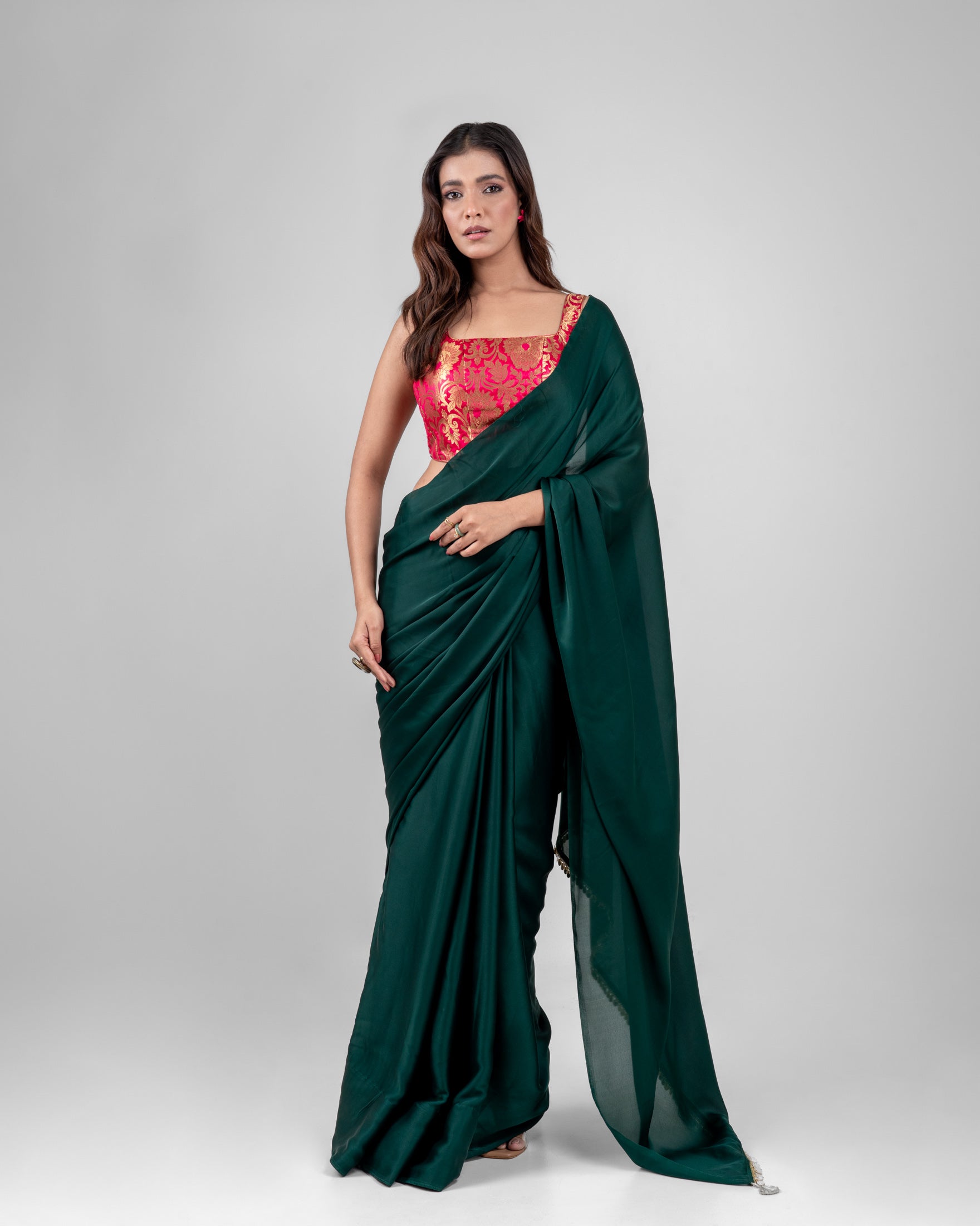 Emerald Green Satin Saree with Handcrafted Mother of Pearl Lace Border and Matching Satin Blouse Piece