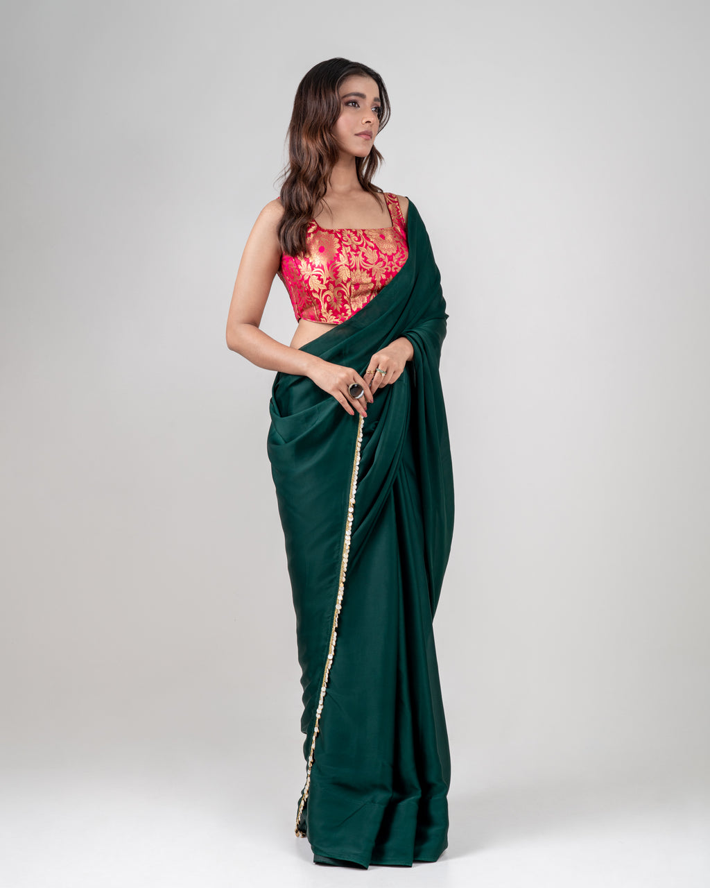Emerald Green Satin Saree with Handcrafted Mother of Pearl Lace Border and Matching Satin Blouse Piece