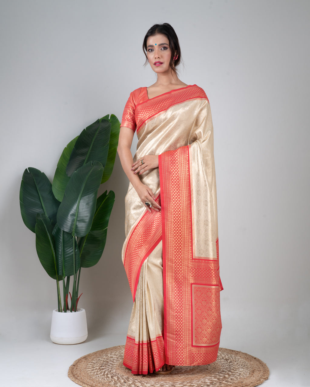 Champagne Gold Banarasi Silk Saree with Coral Zari Border and Matching Blouse Piece