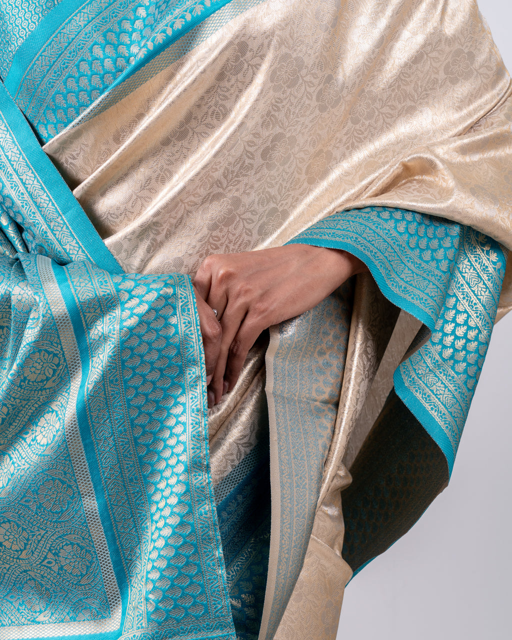 Champagne Gold Banarasi Silk Saree with Aqua Blue Zari Border and Matching Blouse Piece